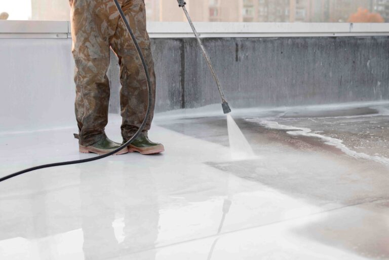The people cleaning floor with machine.